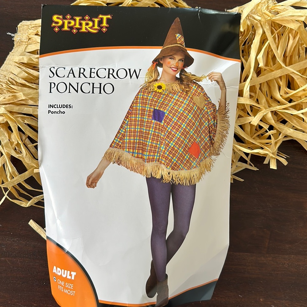 Spirit Scarecrow Poncho with straw for hands and feet.